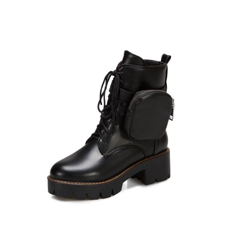 Stylish black lace-up platform boots with pocket, perfect for steampunk fashion and women's motorcycle style.