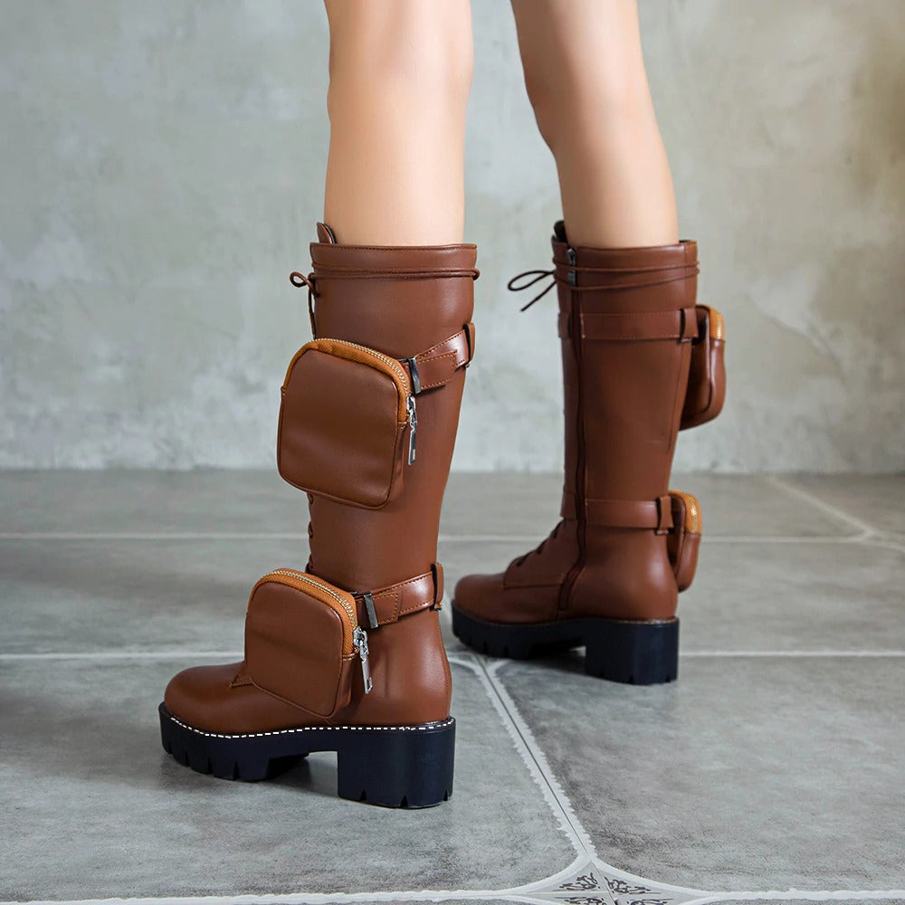Stylish brown motorcycle boots for women with lace-up design, pockets, and chunky heels, perfect for steampunk fashion.