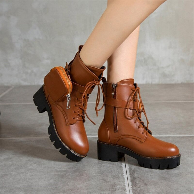 Stylish brown lace-up platform boots for women with chunky heel and side pocket, perfect for steampunk fashion.