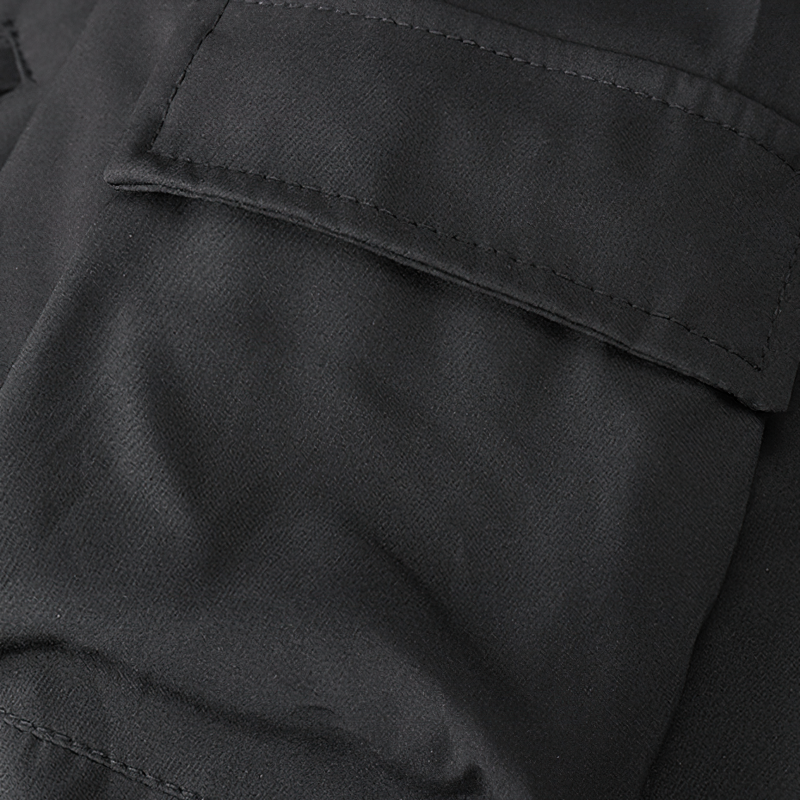 Close-up of the pocket on a black multi-pocket cargo bomber jacket for men, showcasing stylish design and quality fabric.