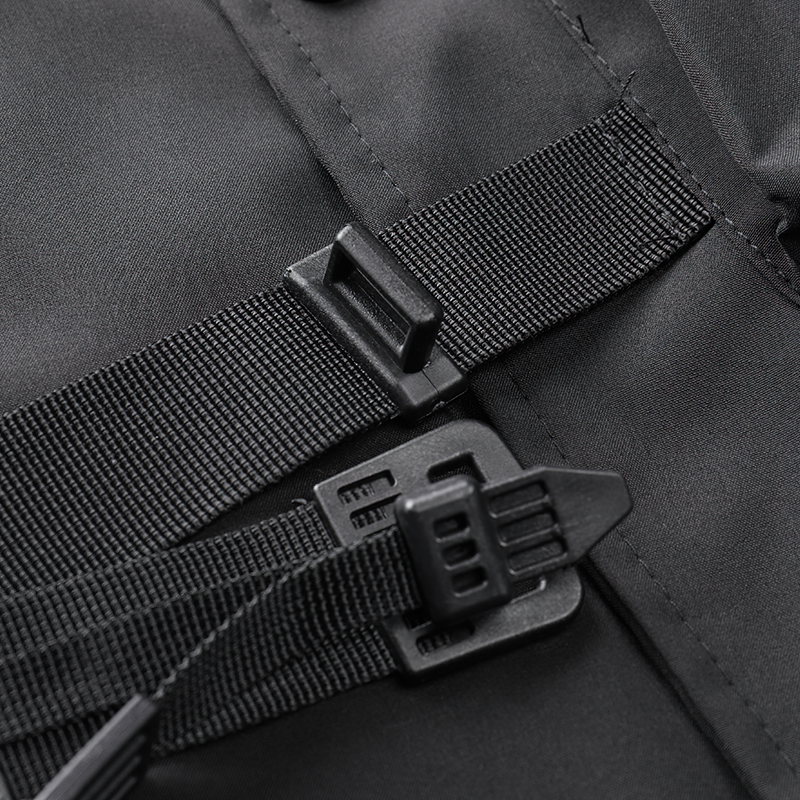 Close-up of black cargo bomber jacket straps showcasing durable buckles and adjustable features for a secure fit.