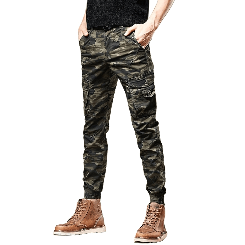 Trendy men's slim fit camouflage denim pants in military style with multi pockets and stylish boots.