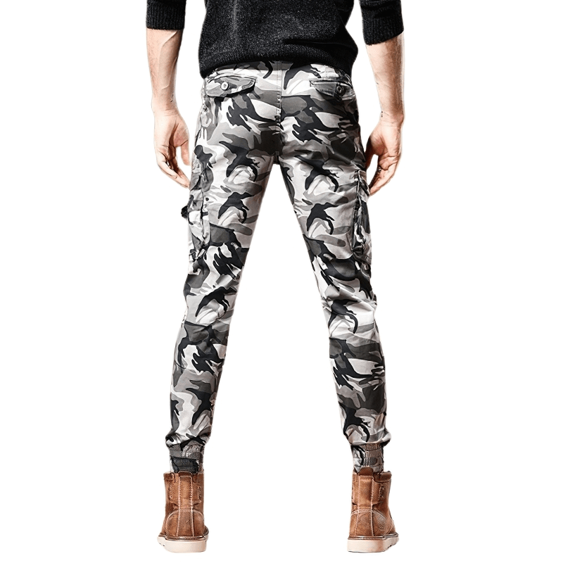 Men's slim-fit camouflage denim pants in military style, showcasing trendy multi-pocket design from the back.