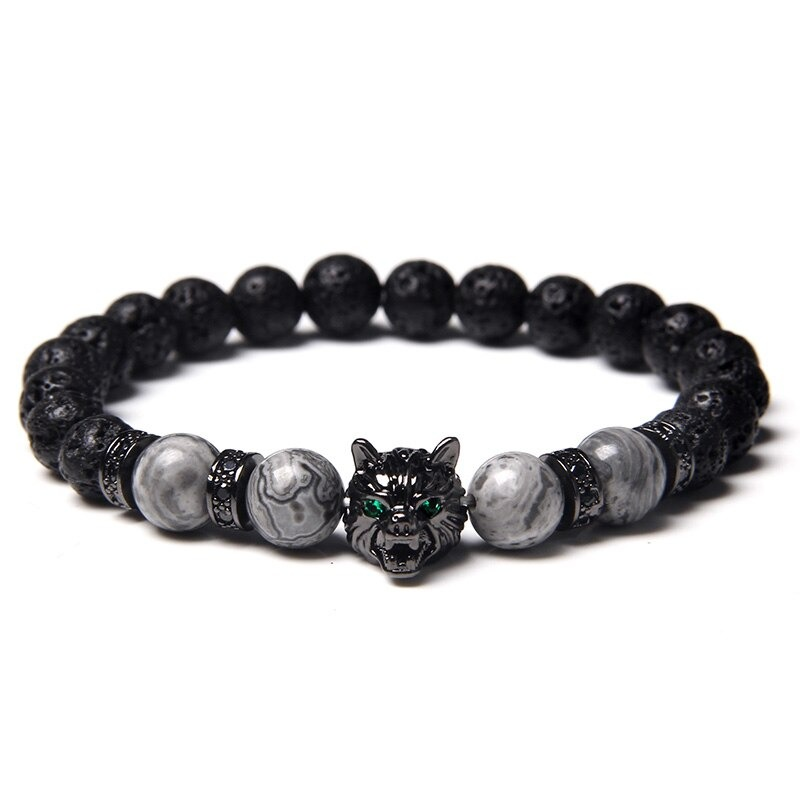 Natural black lava stone bracelet with wolf charm, featuring unique colorful beads, perfect for alternative jewelry lovers.
