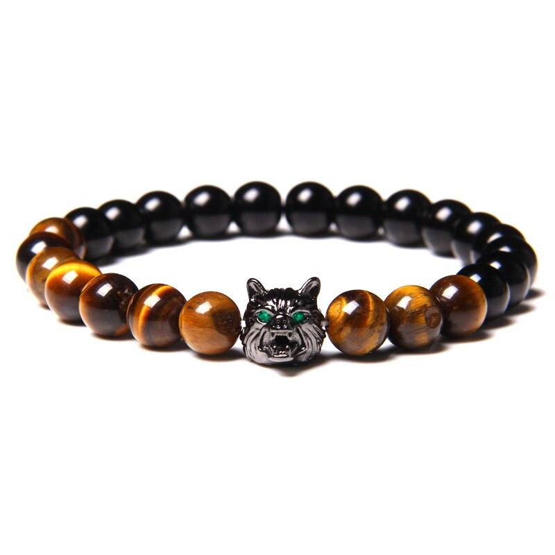 Natural black lava stone bracelet with wolf charm and unique colored beads, perfect for alternative jewelry lovers.