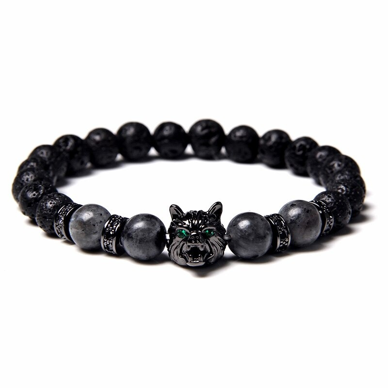 Natural black lava stone bracelet featuring a wolf charm, ideal for alternative jewelry lovers seeking unique animal symbolism.