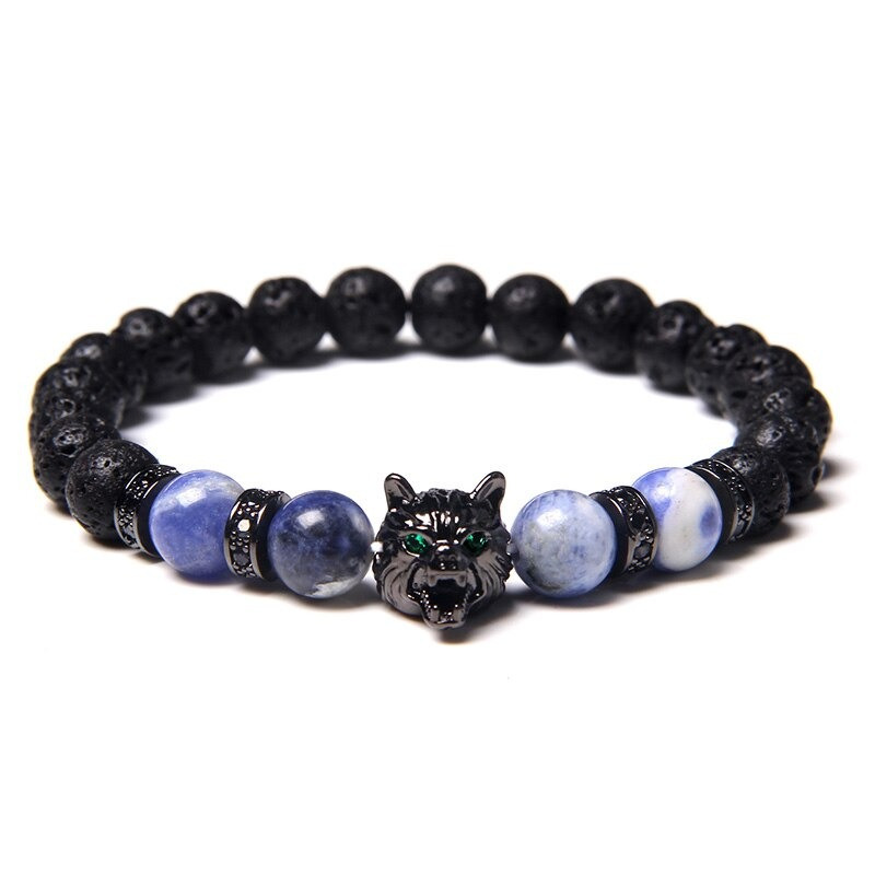 Natural black lava stone bracelet featuring a wolf charm and colorful beads for edgy animal-symbol jewelry.