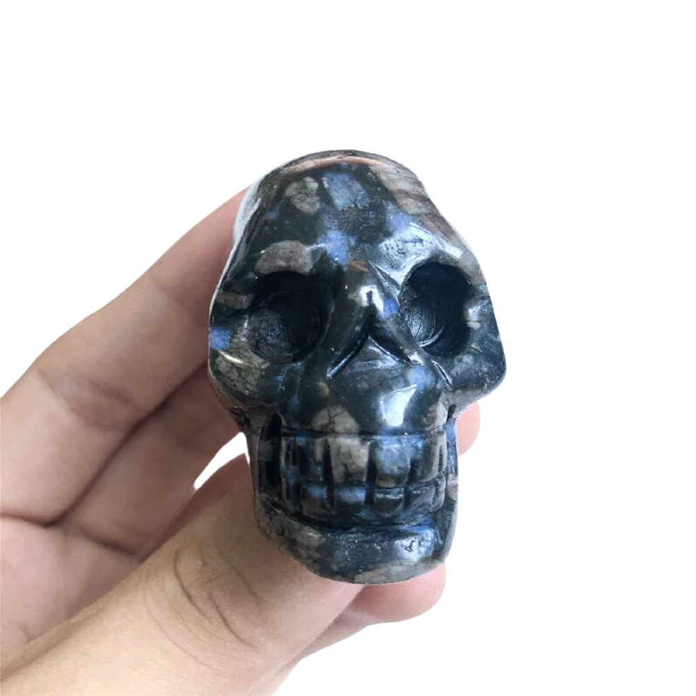 Natural crystal skull hand-held decor for home, perfect for Wicca healing and aesthetic decoration.
