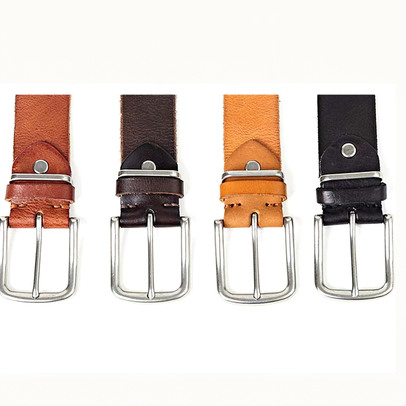 Four stylish natural leather men's belts with silver pin buckles in brown, tan, dark brown, and black colors.