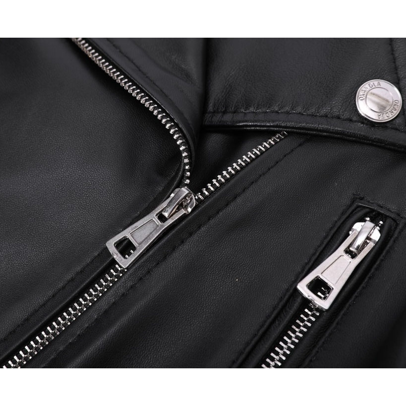 Close-up of stylish black sheepskin leather jacket with silver zippers and rivets, perfect for rock looks.
