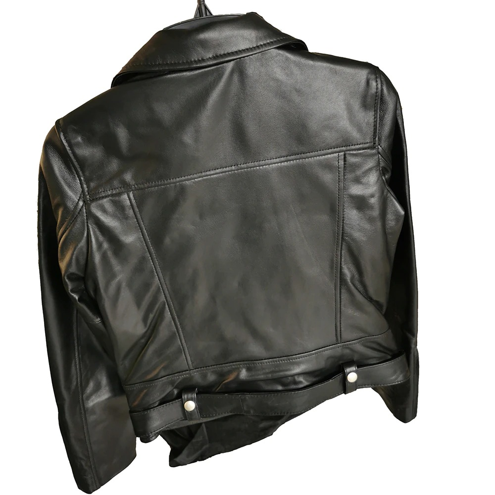 Back view of a stylish women's sheepskin leather jacket in black, featuring classic cut and silver accents.