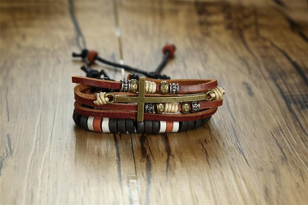 Stylish multi-strand leather bracelet with beads and cross detail, perfect for casual wear for men and women.