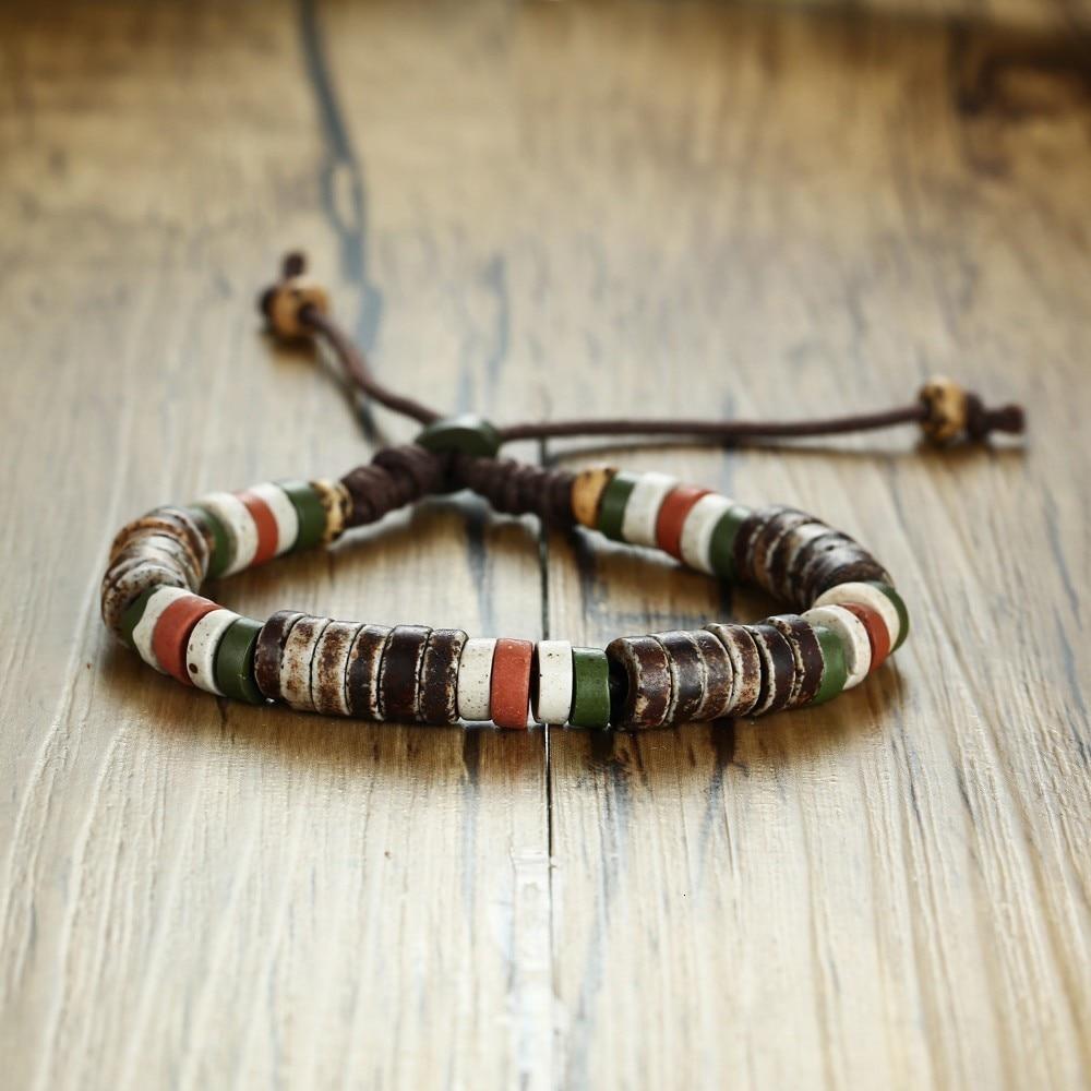 Natural stone beaded bracelet for men and women, adjustable, featuring multicolor beads on a wooden surface.
