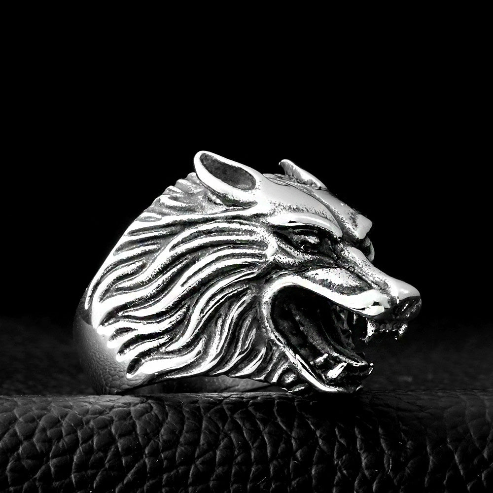 Stainless steel wolf head ring, a striking piece of rock fashion jewelry, perfect for bikers and nature lovers.