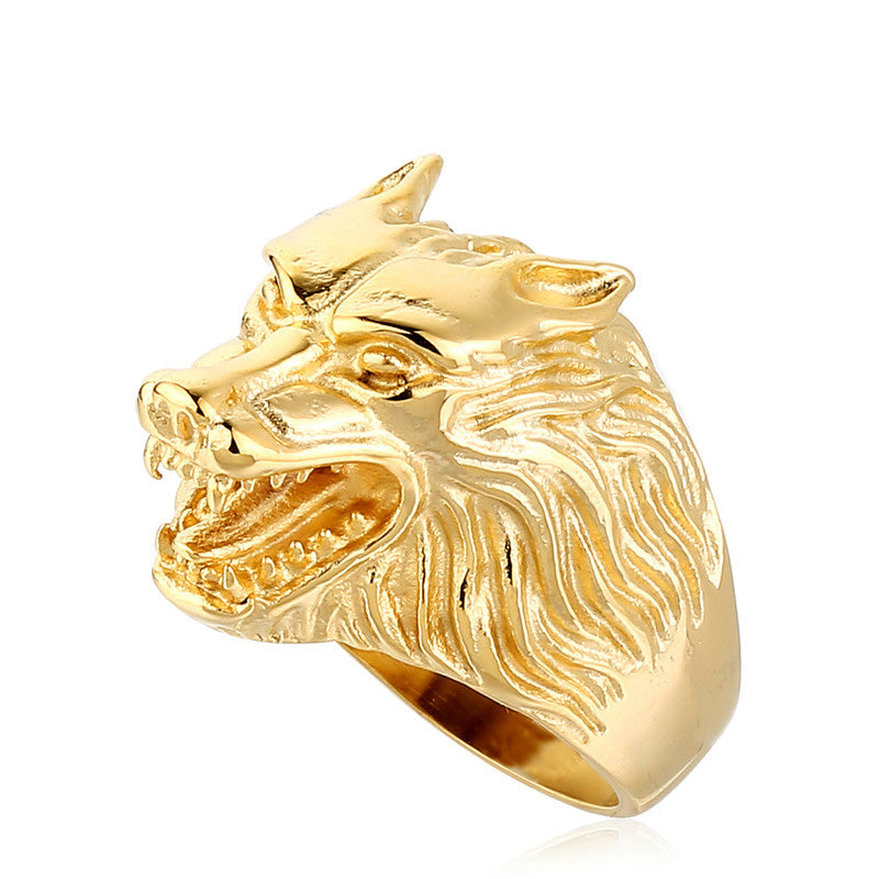 Stainless steel wolf head ring in gold, a cool biker accessory for rock fashion lovers.