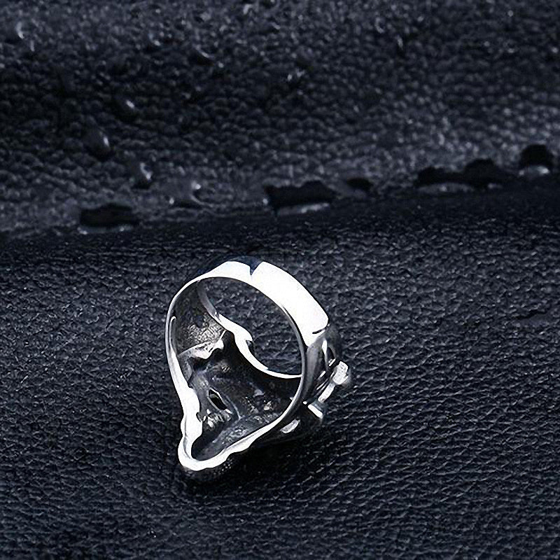 Nordic Wolf Viking Ring resting on black leather, showcasing intricate wolf head design for stylish cosplay jewelry.