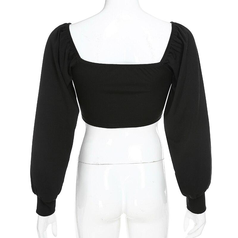 Back view of off-shoulder female top with long sleeves and square collar in black rock style.