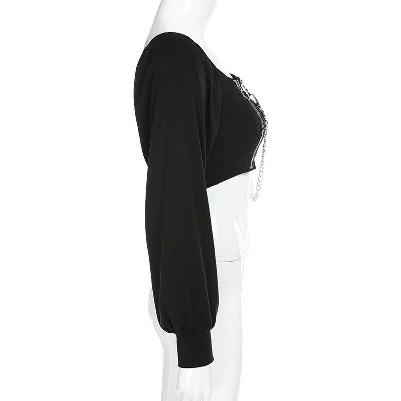 Side view of off-shoulder black female top with long sleeves and zipper decoration, perfect for rock style fashion.
