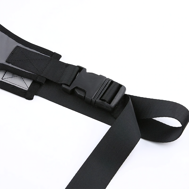 Close-up of a black adjustable belt buckle with nylon straps, perfect for outdoor gear and accessories.