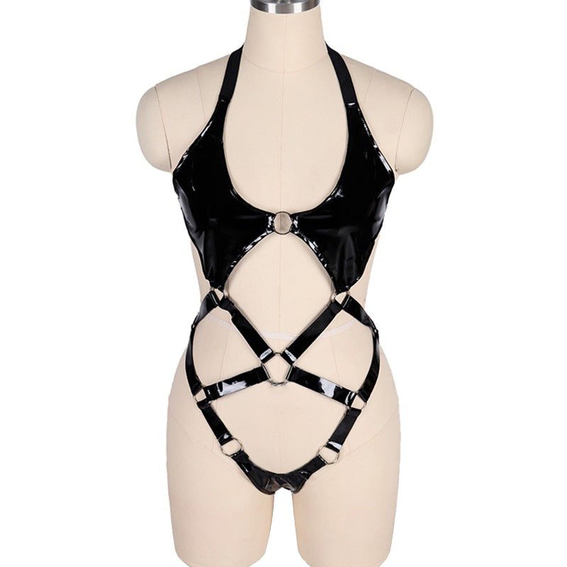 Black patent leather women's bodysuit harness with open design for gothic role play and seductive allure.