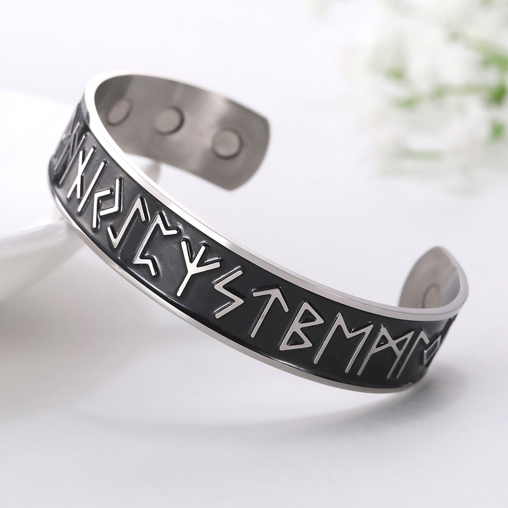 Open cuff magnetic therapy bracelet with antique Nordic rune designs, crafted in stainless steel for unisex wear.