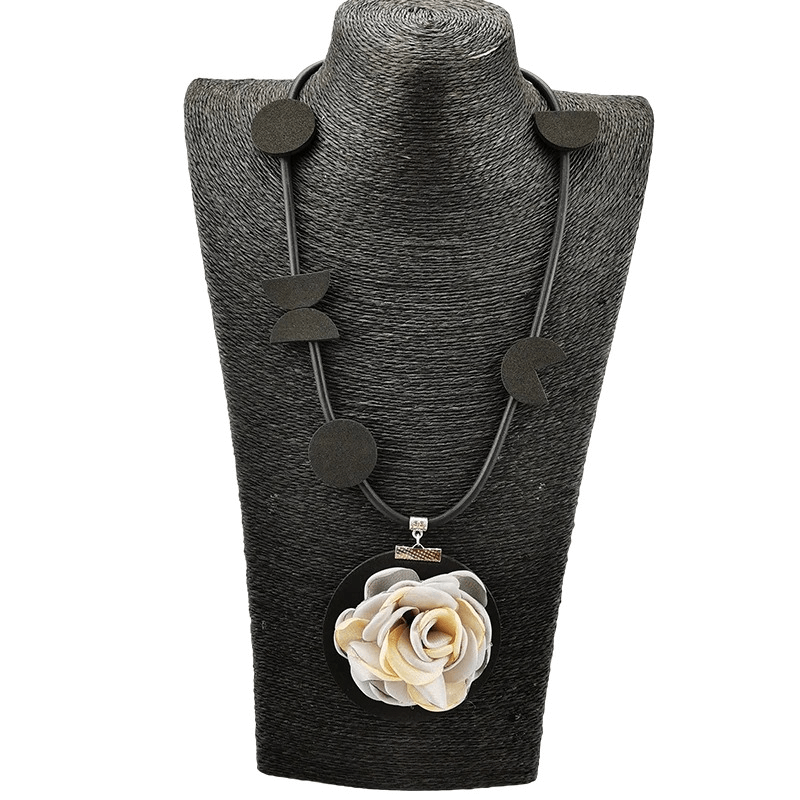 Handmade rubber boho flower pendant necklace for women, featuring unique flower design and stylish black accents.