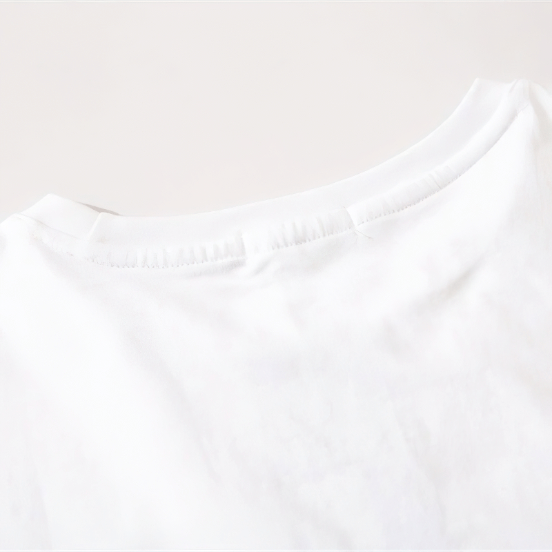 Close-up of the neckline of an Original Design Cotton Men's Tank Top in white fabric, showcasing its casual and trendy style.