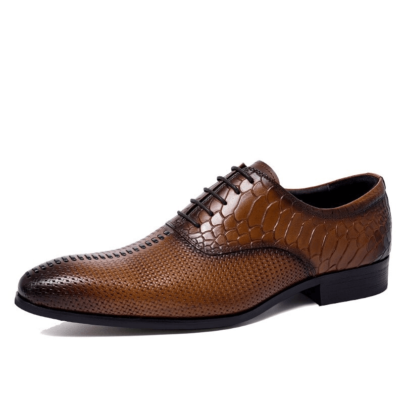 Stylish brown leather lace-up Oxford shoes with unique textured design for men.