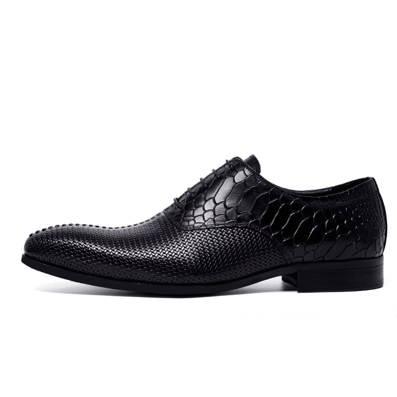 Stylish men's black leather Oxford shoes with unique textured design for luxury casual wear.