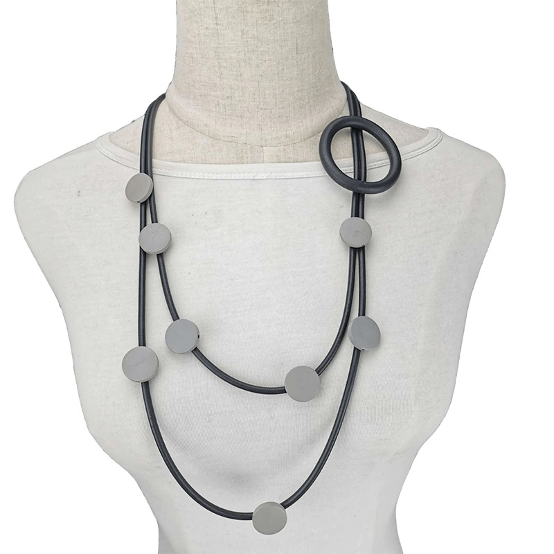 Gothic style rubber necklace with unique circular and round accents, perfect ethnic accessory for women.