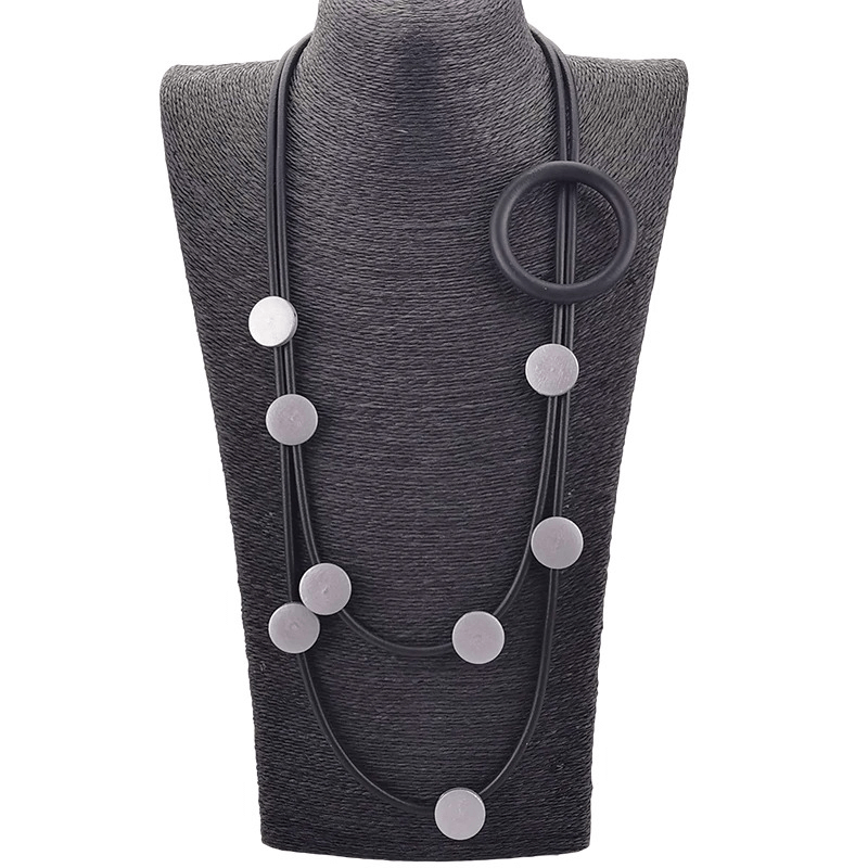 Gothic style rubber necklace with circular and round accents for women, perfect ethnic accessory to enhance your outfit.
