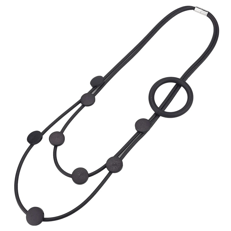 Elegant black rubber necklace featuring a unique gothic and ethnic design for women.