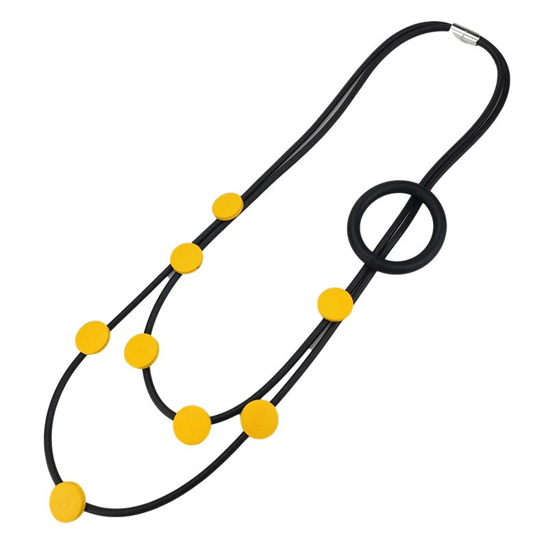 Stylish ethnic rubber necklace featuring black and yellow design, perfect gothic accessory for women.