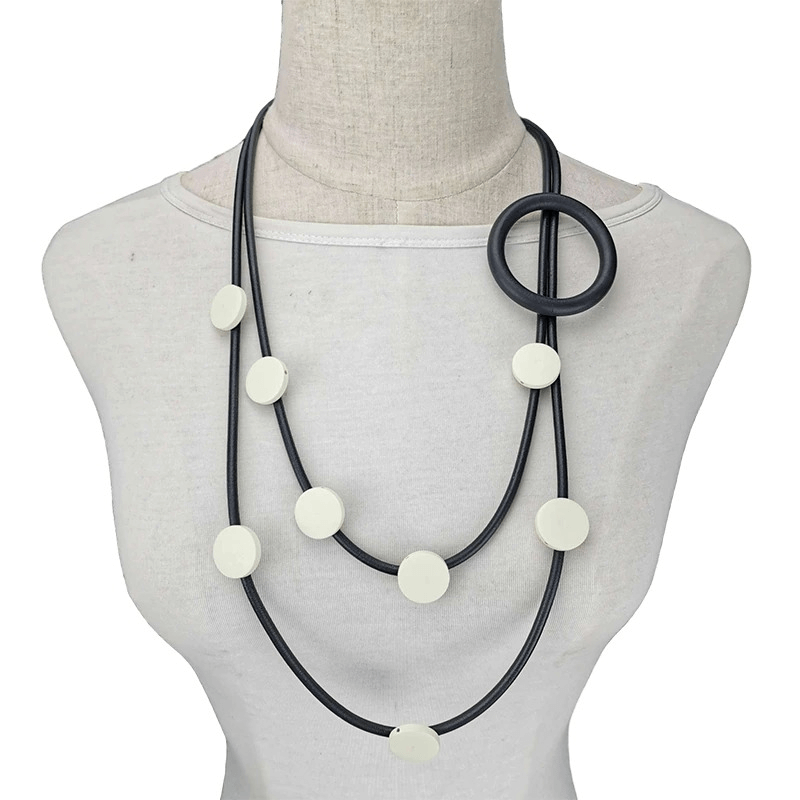 Stylish women's gothic rubber necklace with white accents, perfect ethnic accessory for adding flair to any outfit.