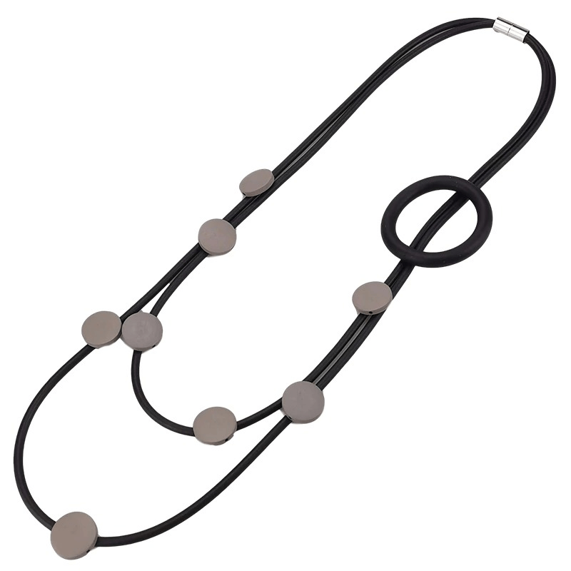 Stylish women’s ethnic rubber necklace in gothic style with metal accents, perfect for enhancing any outfit.