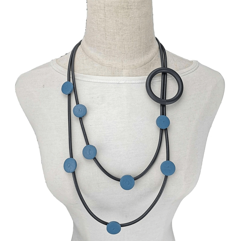 Stylish women's gothic rubber necklace in blue, featuring an ethnic design and circular accents, perfect for any outfit.
