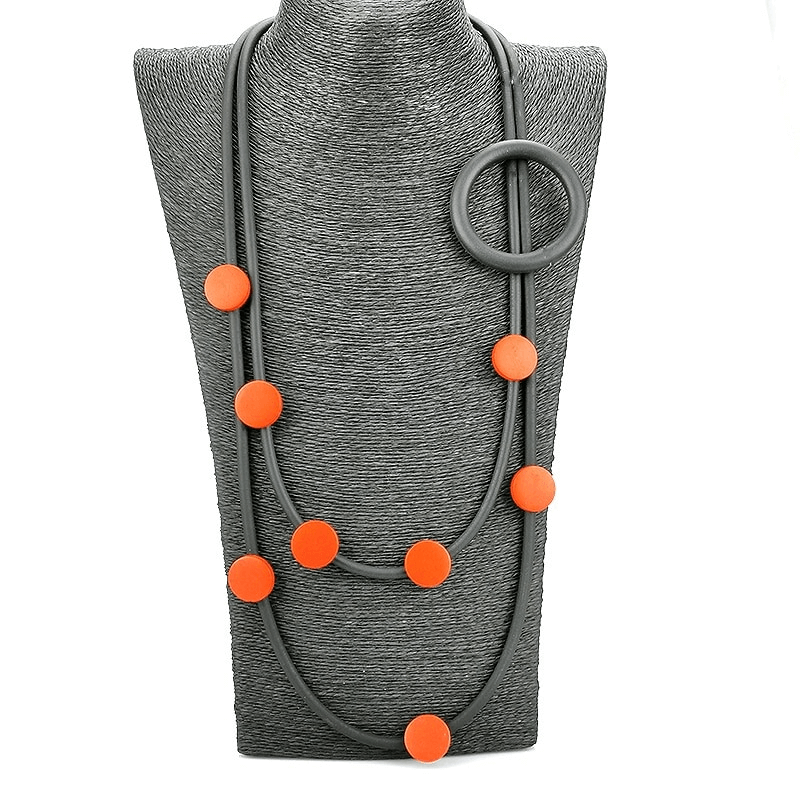 Gothic style rubber necklace with orange accents, perfect ethnic accessory for women to elevate their outfits.