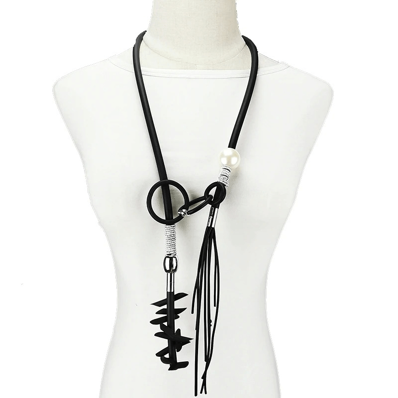 Stylish black women's necklace with removable details, featuring punk design and unique loop elements.
