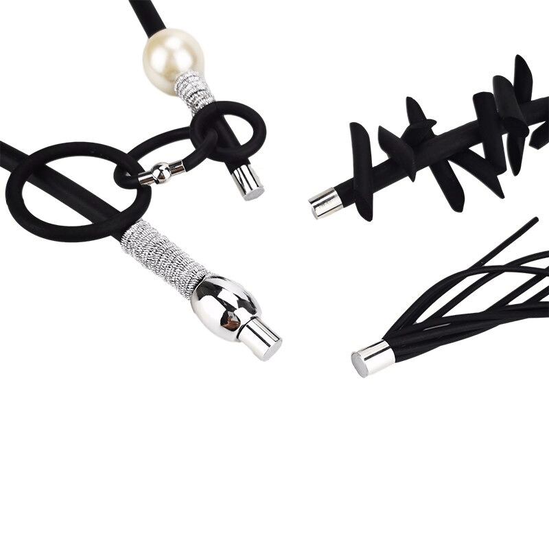 Close-up of vintage punk women's necklace with removable black details and pearl accents for stylish accessories.