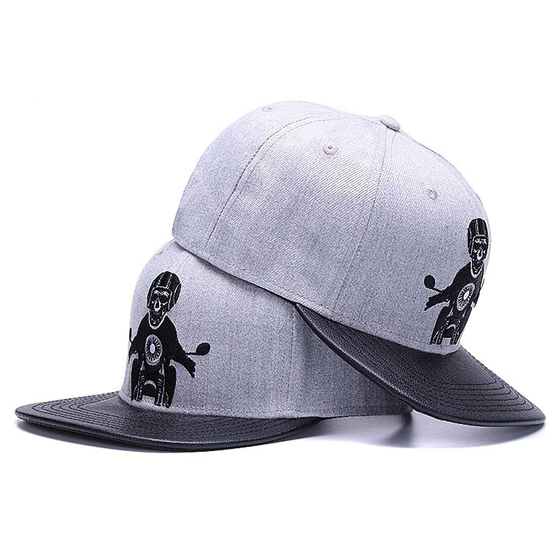 Gray unisex baseball cap featuring embroidered skeleton riding a motorcycle, perfect for punk rock style outfits.
