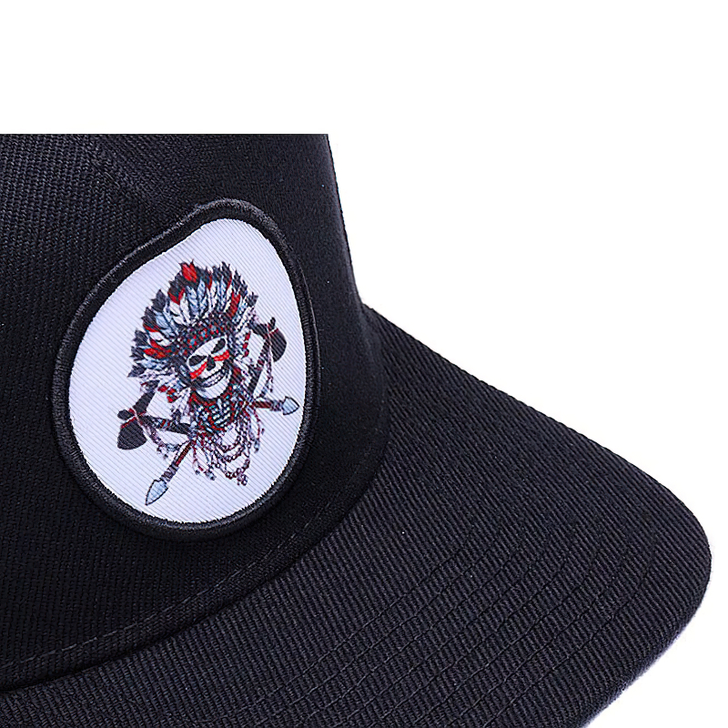 Embroidered skeleton patch on a black snapback baseball cap, showcasing a cool unisex design for casual style.