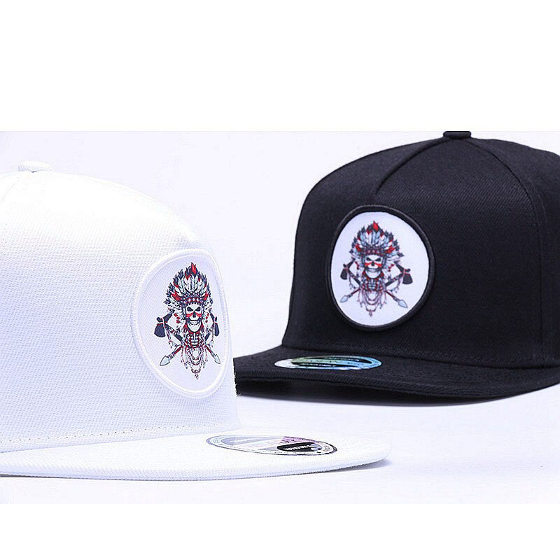 Original snapback baseball caps in white and black, featuring eye-catching embroidered designs for a stylish unisex look.