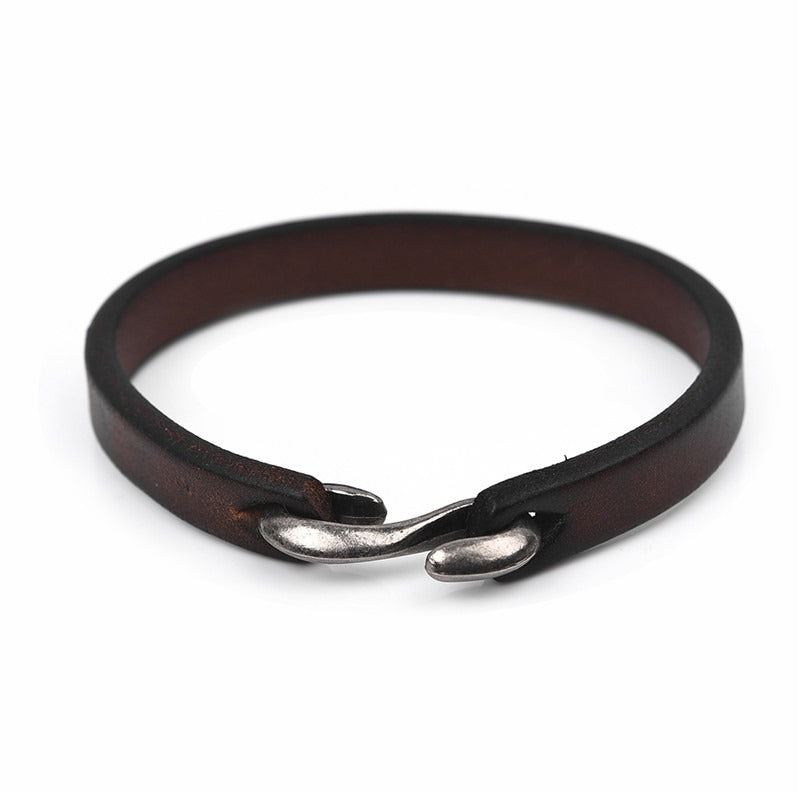 Vintage black brown genuine leather bracelet with a simple silver clasp, perfect for a grunge style look.