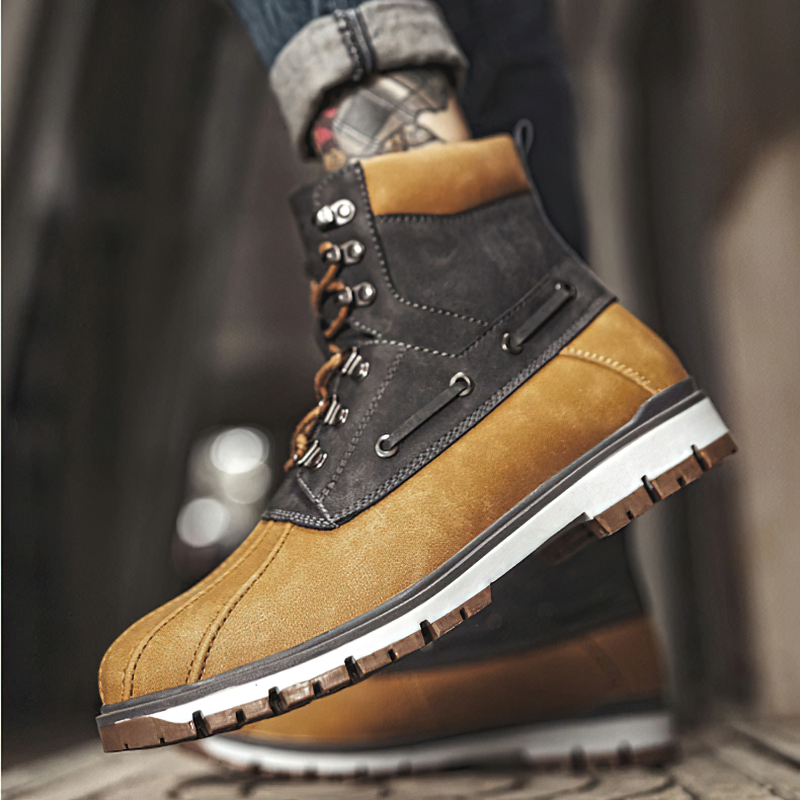 Men's outdoor waterproof motorcycle boots in brown and black with plush interior for warmth and comfort during winter adventures.