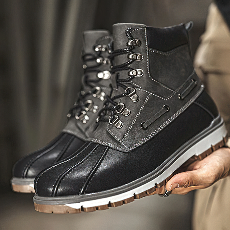 Men's outdoor waterproof motorcycle boots in black and gray, showcasing modern design and comfort for winter wear.