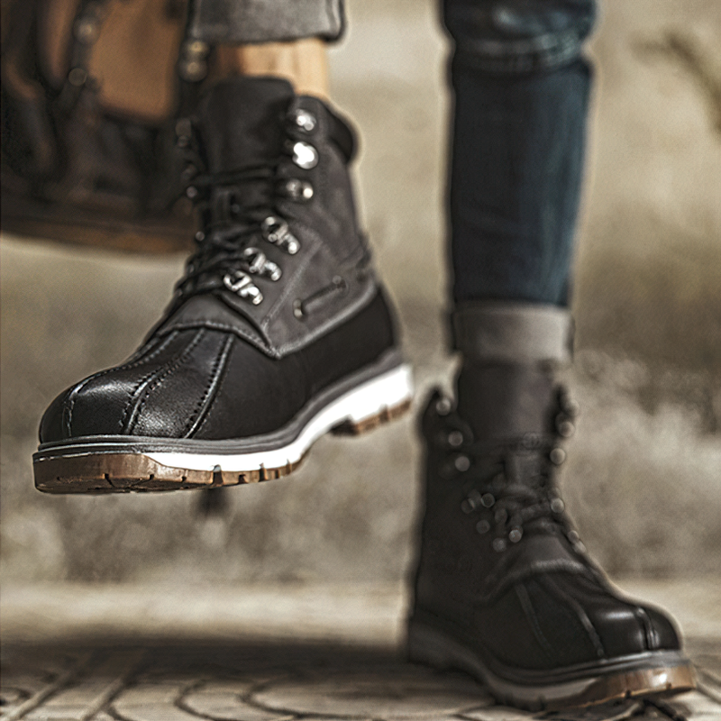 Men's outdoor waterproof motorcycle boots in black, featuring plush lining and modern design for comfort in casual settings.