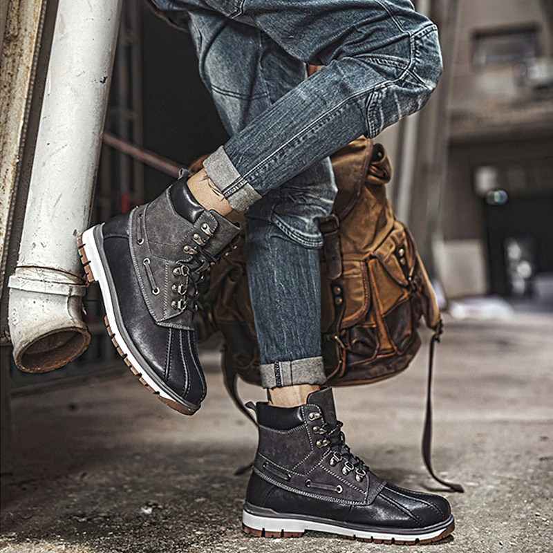 Stylish outdoor waterproof men's motorcycle boots in black and gray, perfect for casual wear and winter adventures.