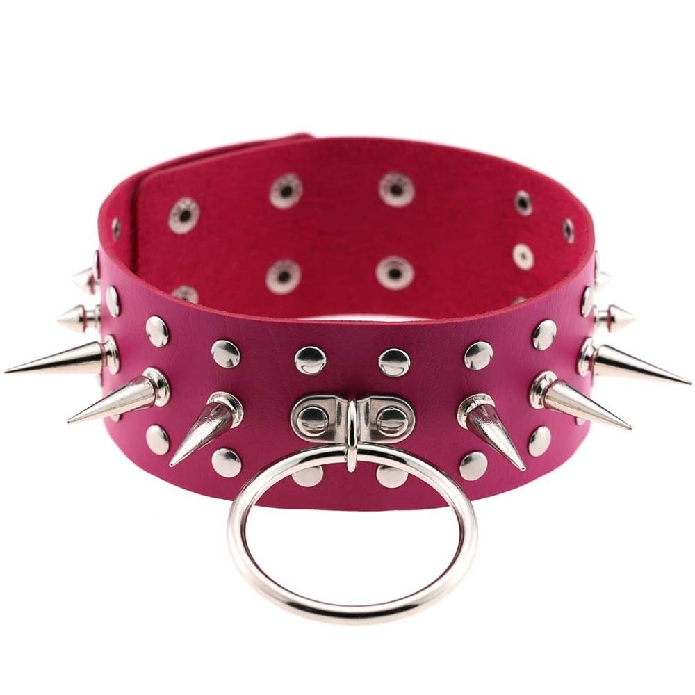 Oversized pink faux leather choker with spikes and ring, perfect for gothic and punk fashion.