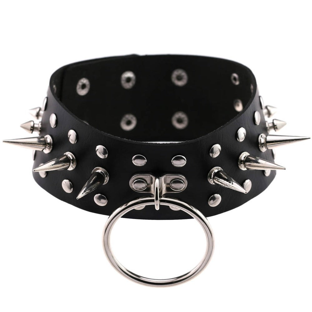 Oversized black faux leather choker with spikes and a ring, perfect for gothic and punk fashion styles.