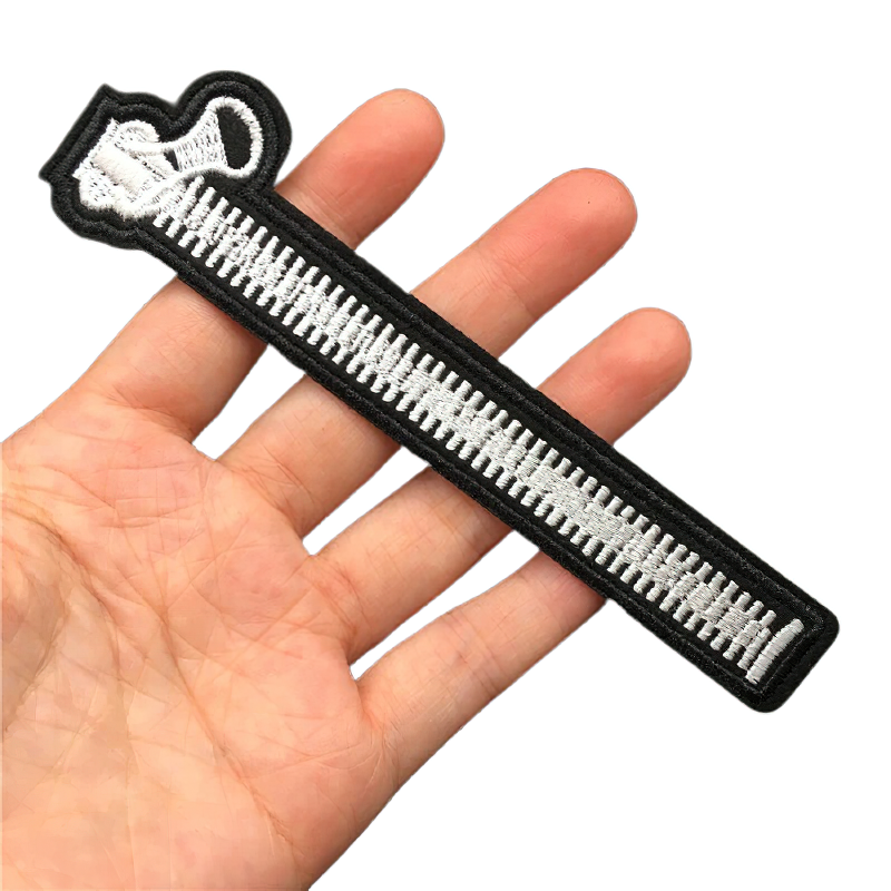 Stylish gothic unisex patch shaped like a zipper, perfect for adding flair to clothing accessories.